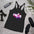 Famous - Women's Racerback Tank